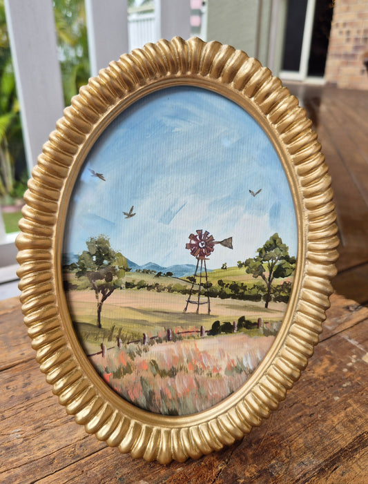 Oval gold-framed mini